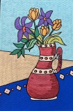 Cinnamon-Vase-with-Eyeballs-on-Blue-Table